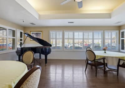 Entertainment and dining room with a piano