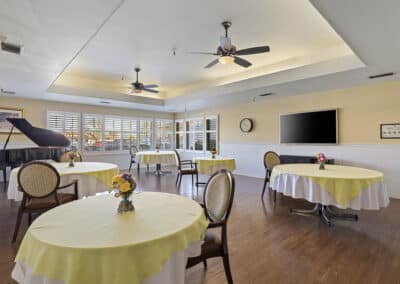 Entertainment and dining room with a piano