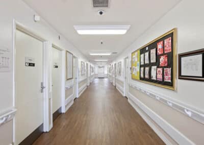 Hallway with entrances into bedrooms